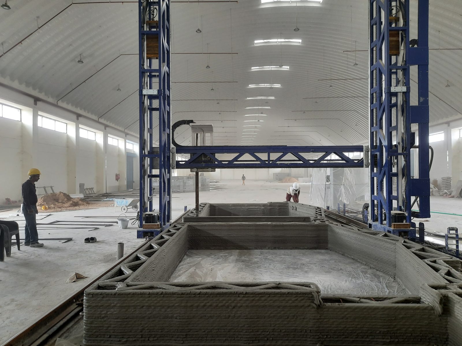 A large construction element being printed on MiCoB's gantry system.