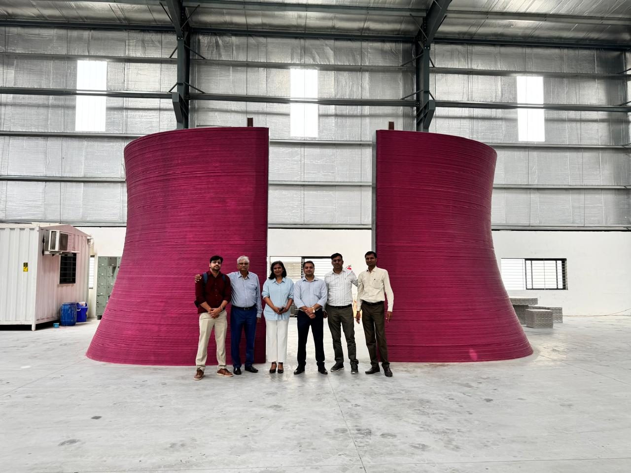 Large curved printed forms produced as a single continuous print.