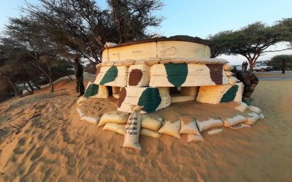 3D-printed bunker deployed in a desert border environment.